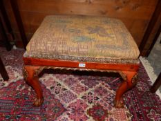 A GEO I STYLE DRESSING STOOL ON CARVED CABRIOLE LEGS AND CLAW AND BALL FEET. 64 x 49 x 50cms (H).