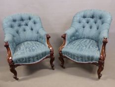 A PAIR OF VICTORIAN CARVED MAHOGANY ARMCHAIRS UPHOLSTERED IN DEEP TURQUOISE DAMASK. SCROLLS BELOW TH