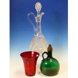 A CUT GLASS CLARET JUG AND STOPPER, A GREEN GLASS FLASK WITH METAL MOUNTED CORK STOPPER TOGETHER