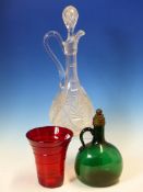 A CUT GLASS CLARET JUG AND STOPPER, A GREEN GLASS FLASK WITH METAL MOUNTED CORK STOPPER TOGETHER