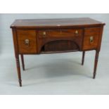 A 19th C. MAHOGANY BOW FRONT SIDEBOARD, THE CENTRAL DRAWER OVER A TAMBOUR AND FLANKED BY A