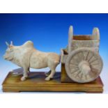 AN EARLY CHINESE POTTERY FIGURAL GROUP OF A BULLOCK AND CART. POSSIBLY TANG DYNASTY. H. 30cm.