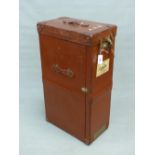 AN ELGIN LEATHER Co. BOMBAY LEATHER CABIN WARDROBE TRUNK WITH GREEN CANVAS COVER, ONE NARROW END LIF