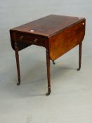 A REGENCY ROSEWOOD AND CROSS BANDED PEMBROKE TABLE WITH END DRAWER, ON RING TURNED LEGS WITH BRASS