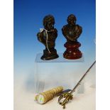 A DECORATIVE BRONZE BUST OF NELSON. H 13cms. A BUST OF MOZART. H 13cms. A MINIATURE SWORD AND