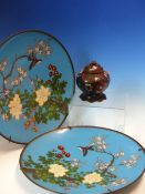 A PAIR OF JAPANESE CLOISONNE SKY BLUE GROUND DISHES ENAMELLED WITH BIRDS AND FLOWERS. Dia. 30.