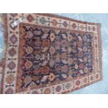 AN ANTIQUE PERSIAN QASHQAI RUG. 216 x 153cms.