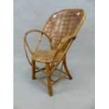 A WOVEN SPLIT WALNUT AND RUSTIC BENTWOOD ELBOW CHAIR, THE HOOP BACK AND CIRCULAR SEAT OF WOVEN