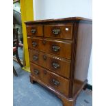 A BEL FURNITURE LTD WALNUT CHEST OF DRAWERS/TELEVISION CABINET, THE TOP THREE DRAWER FRONT LIFTING
