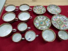 A VARIED COLLECTION OF FOURTEEN CANTON TEA AND COFFEE WARES WITH ALTERNATING FIGURE AND GARDEN