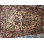 A TURKISH RUG OF PERSIAN DESIGN. 183 x 116cms.