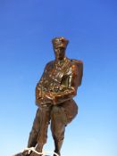 A COPPER COATED FIGURE OF A WORLD WAR I SOLDIER FROM THE ARTISTS RIFLES. H 23cms.