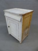 A PAINTED PINE CASED WASH BASIN WITH LIFT UP TOP, CUPBOARD BASE. W 64