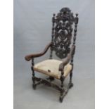 A 17th C. FRENCH STYLE OAK ELBOW CHAIR, THE TALL BACK PIERCED AND CARVED WITH FOLIAGE SPLAT