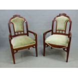 A PAIR OF ART NOUVEAU MAHOGANY CHAIRS, THE FOLIATE INCISED CRESTING TO OLIVE VELVET UPHOLSTERED