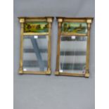 TWO 19th C. RECTANGULAR MIRRORS IN SIMILAR GILT FRAMES AND WITH VERRE EGLOMISE PANELS BELOW THE
