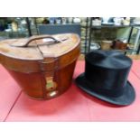 A RED SILK LINED LEATHER CASED HENRY HEATH TOP HAT WITH BLACK SILK PILE, THE INSIDE OF THE HAT. 8