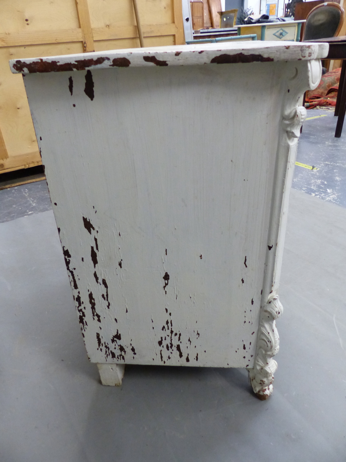 A 19th C. PAINTED PINE CHEST OF THREE DRAWERS BELOW A SERPENTINE FRONTED TOP AND ON FOLIATE CARVED - Image 7 of 10