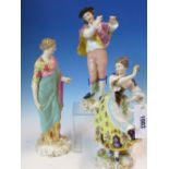 A PAIR OF GERMAN PORCELAIN FIGURES OF A FLAUTIST PLAYING TO A DANCING LADY. H 25cms. A GERMAN