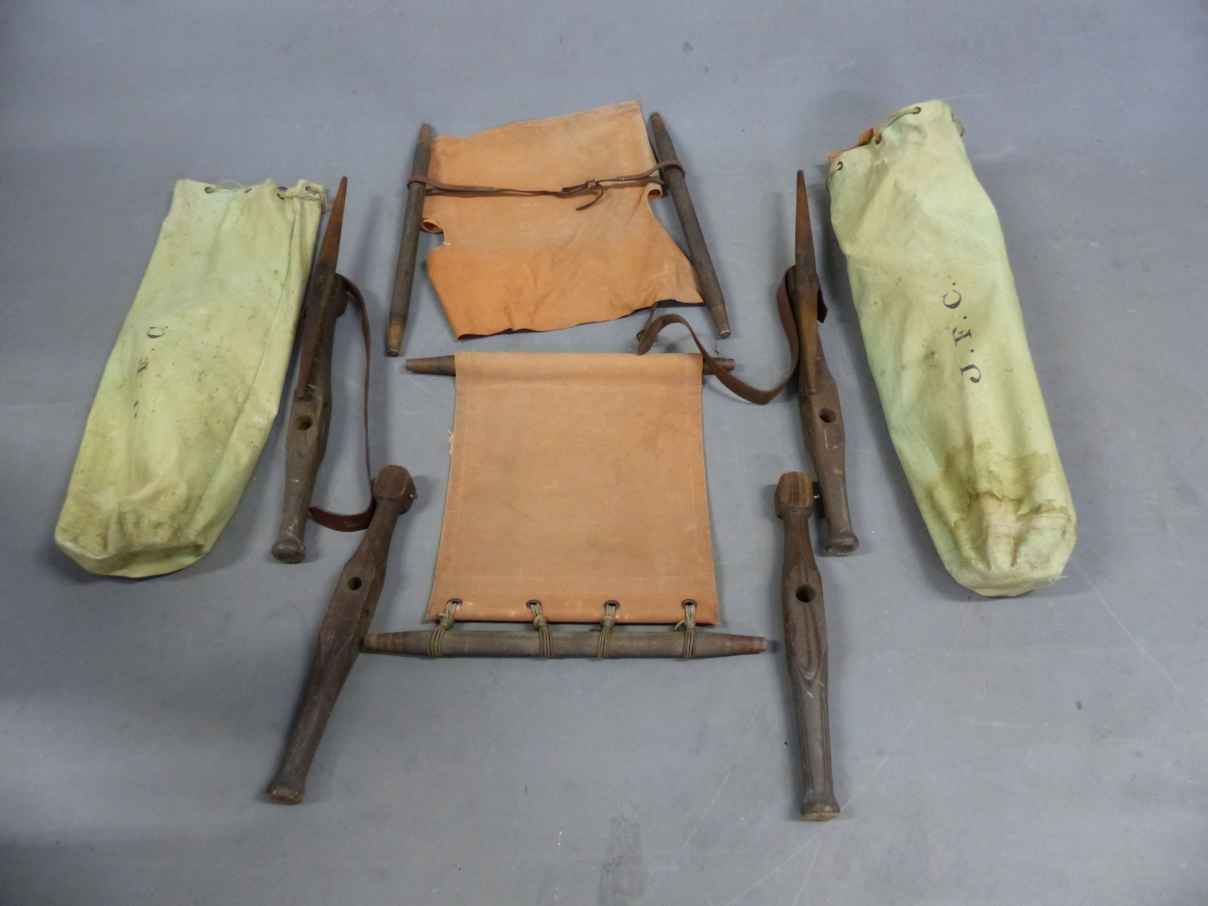 A PAIR OF VINTAGE CAMPAIGN SAFARI CHAIRS, COMPLETE IN CANVAS CARRY BAGS (2).