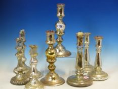 A COLLECTION OF FOUR PAIRS AND ANOTHER VARNISH GLASS CANDLESTICKS, THE TALLEST OF THE INTERNALLY