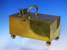 A 19TH CENTURY BRASS PENNY IN THE SLOT TOBACCO BOX WITH KEY, INDISTINCT PATENT MARK, POSSIBLY FOR