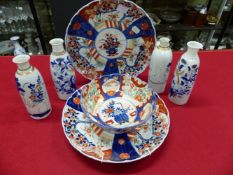 FOUR JAPANESE IMARI WARES, TO INCLUDE: TWO DISHES, A BOWL AND A FUKUGAWA VASE. H 18.5cms. TOGETHER