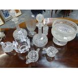 A COLLECTION OF CUT GLASS, TO INCLUDE: A PAIR OF GLOBE AND SHAFT DECANTERS, TWO JUGS, AN ORREFORS