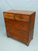 A BRASS BOUND 19TH CENTURY TEAK CAMPAIGN CHEST OF TWO SHORT AND THREE LONG DRAWERS ON BUN FEET. W 97