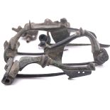 A ROMAN WHITE METAL BOW BROOCH THREE OTHERS IN BRONZE AND A FIFTH OF KITE SHAPE