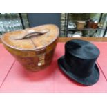 A ROBERT HEATH RED SILK LINED LEATHER CASE WITH TRESS AND CO. TOP HAT WITH BLACK SILK PILE, THE
