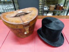 A ROBERT HEATH RED SILK LINED LEATHER CASE WITH TRESS AND CO. TOP HAT WITH BLACK SILK PILE, THE