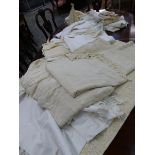 A LARGE COLLECTION OF ANTIQUE AND LATER WHITE WORK TABLE LINEN AND COVERS INCLUDING NAPKINS,