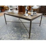A MODERNIST COFFEE TABLE WITH SQUARE SECTION WROUGHT IRON BASE AND OAK PLANK TOP. 120 x 80 x H.