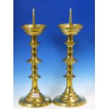 A PAIR OF BRASS PRICKET CANDLESTICKS, THE CIRCULAR FEET INSCRIBED ST JAMES THE LESS, EAST HANNEY,