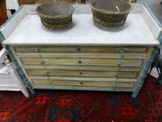 A CONTINENTAL WHITE MARBLE GALLERIED AND TOPPED PINE CHEST OF FOUR DRAWERS PAINTED IN CREAM AND