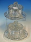 A PAIR OF CUT GLASS SWEETMEAT JARS, COVERS AND STANDS, POSSIBLY IRISH, THE BUN KNOPPED LIDS WITH