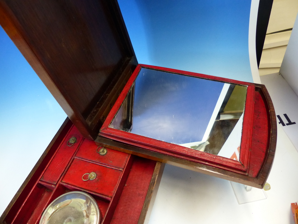 A ROSEWOOD GENTLEMANS CAMPAIGN TRAVEL BOX, THE INSIDE OF THE LID WITH RED SCRIM BACKED MIRROR - Image 12 of 17