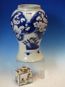 A CHINESE BLUE AND WHITE BALUSTER VASE PAINTED WITH BLOSSOMING TREES. H 28cms. TOGETHER WITH A
