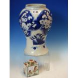 A CHINESE BLUE AND WHITE BALUSTER VASE PAINTED WITH BLOSSOMING TREES. H 28cms. TOGETHER WITH A