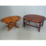 A 19th.C. MAHOGANY BUTLERS TRAY WITH HINGED SIDES, STANDING ON FOLDING CROSS FRAME STAND.