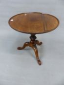 A 19th C. MAHOGANY WINE TABLE, THE DISHED CIRCULAR TOP ON A GADROONED BASED COLUMN, THE KNEES OF THE