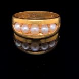 AN ANTIQUE 18ct GOLD HALLMARKED GRADUATING PEARL HALF HOOP RING. DATED 1879, LONDON. FINGER SIZE