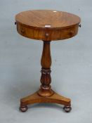 A 19th C. MAHOGANY DRUM TOPPED TABLE WITH ALTERNATING FALSE AND REAL APRON DRAWERS, THE BALUSTER