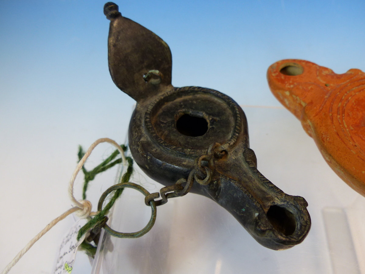 A ROMAN BRONZE OIL LAMP WITH HANGING CHAIN AND LEAF SHAPED HANDLE. W 11.5cms. TOGETHER WITH A - Image 3 of 14