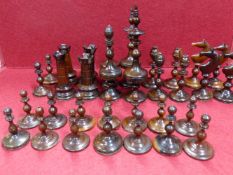 A 19th C. KILLARNEY TURNED ARBUTUS WOOD CHESS SET, ONE SIDE MARGINALLY PALER THAN THE OTHER, THE