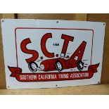 A RARE ENAMEL SIGN FOR S.C.T.A. SOUTHERN CALIFORNIA TIMING ASSOCIATION.