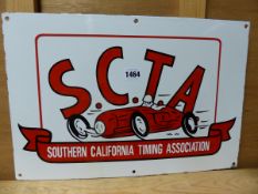 A RARE ENAMEL SIGN FOR S.C.T.A. SOUTHERN CALIFORNIA TIMING ASSOCIATION.