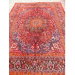 A PERSIAN CLASSIC DESIGN CARPET. 380 x 278cms.