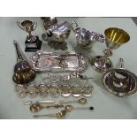 TWO SILVER PLATED WINE FUNNELS, A SHELL FORM SPOON WARMER, CANDLE SNUFFER AND TRAY, A CHALICE, PLACE